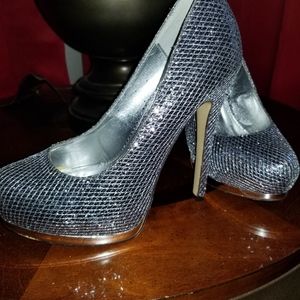 Shiny silver heels